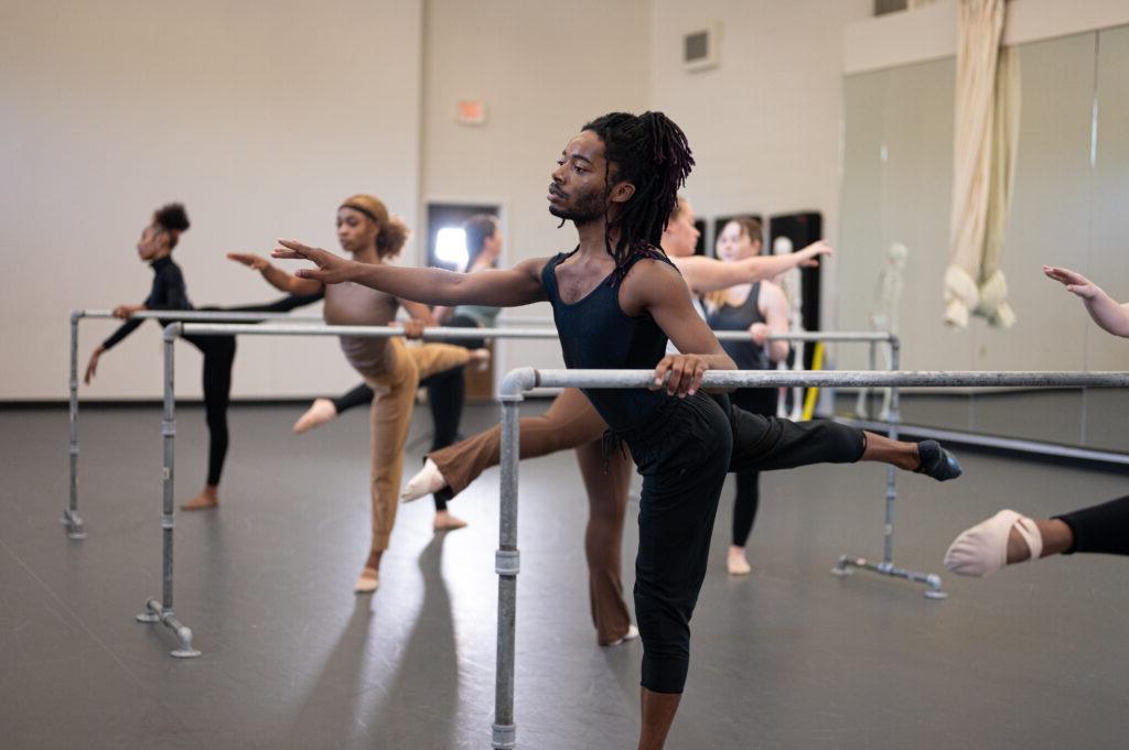 A dancer practices in class.